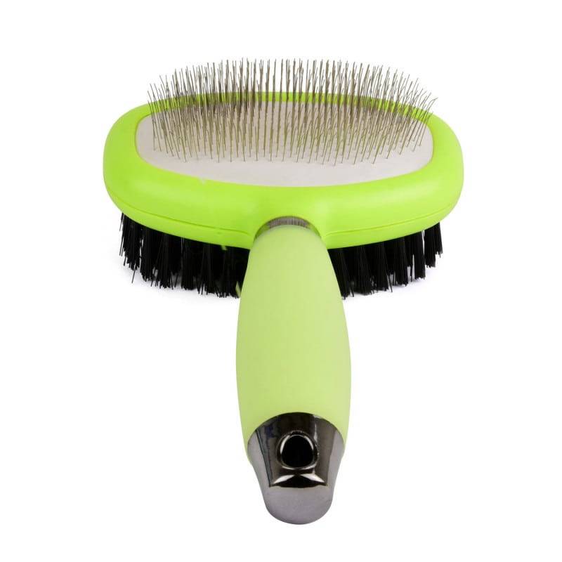 Green dual pet grooming brush with fine bristles and black cleaning bristles